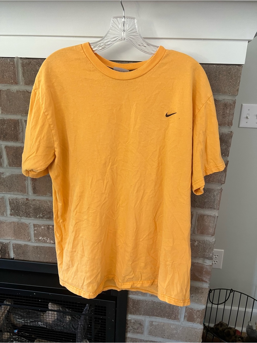 Nike Short-Sleeve Tee in Golden Yellow with Black Swoosh